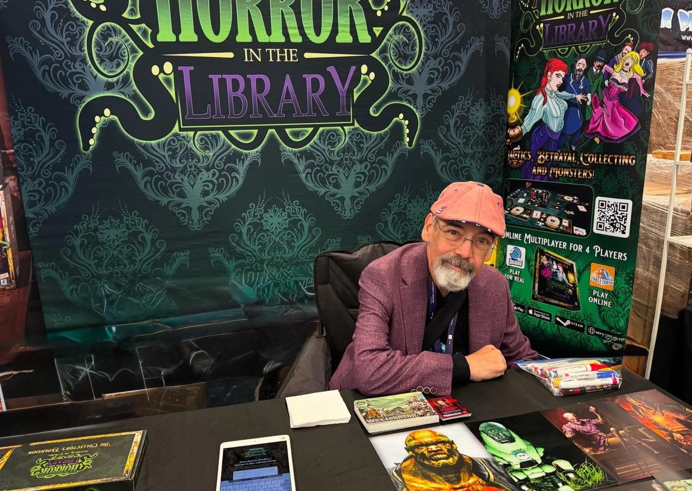 Blue Donut Games presenting Horror in the Library at a trade show stand