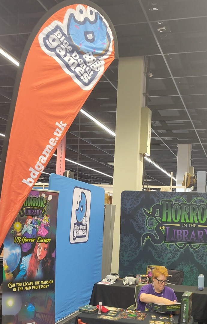 Blue Donut Games stand at a games show